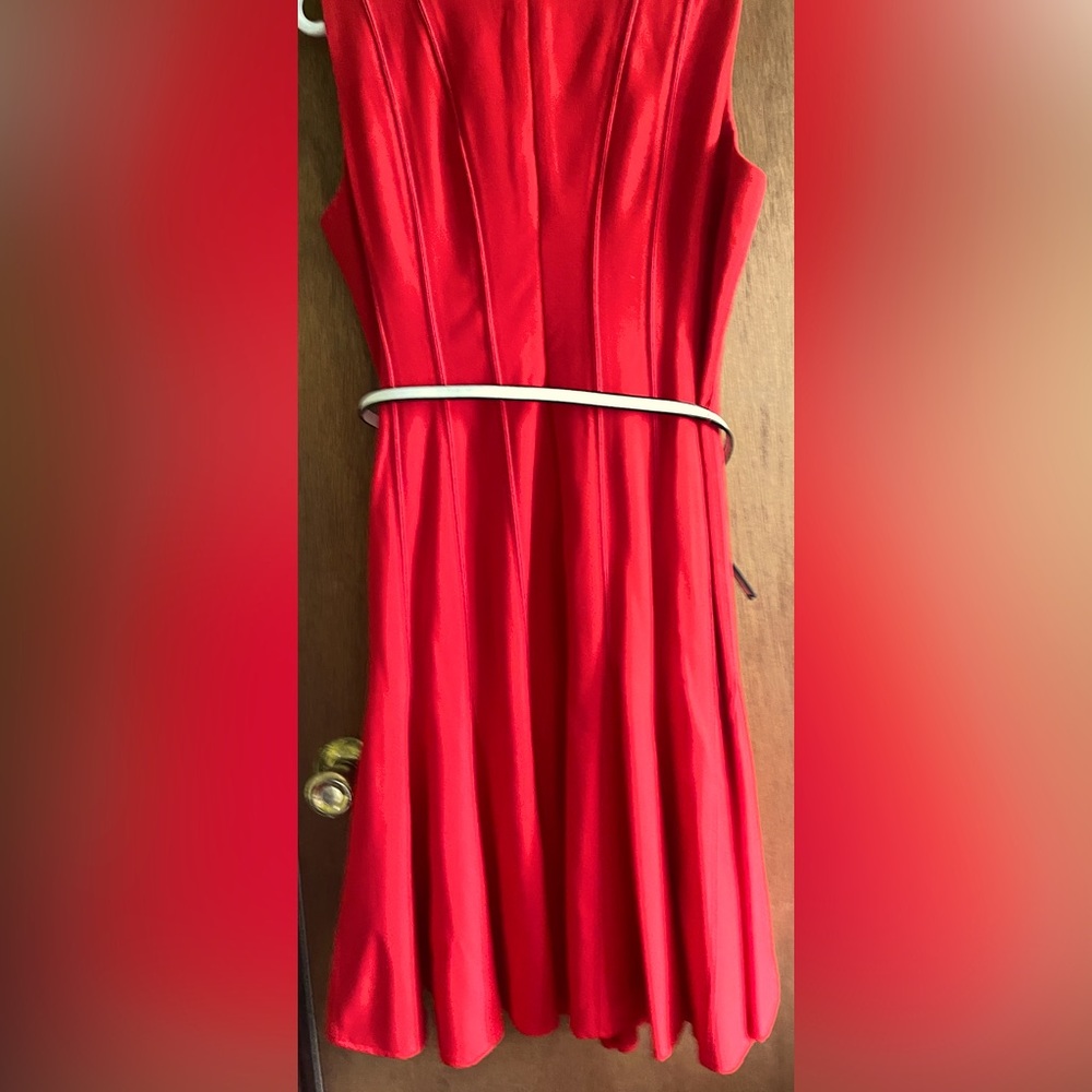 Red dress used once. Fit and flare knee length. Comes with the belt.